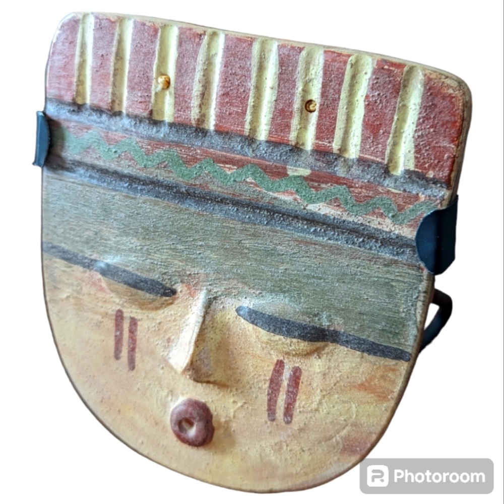 Clay pottery decorative face Cusco Peru
